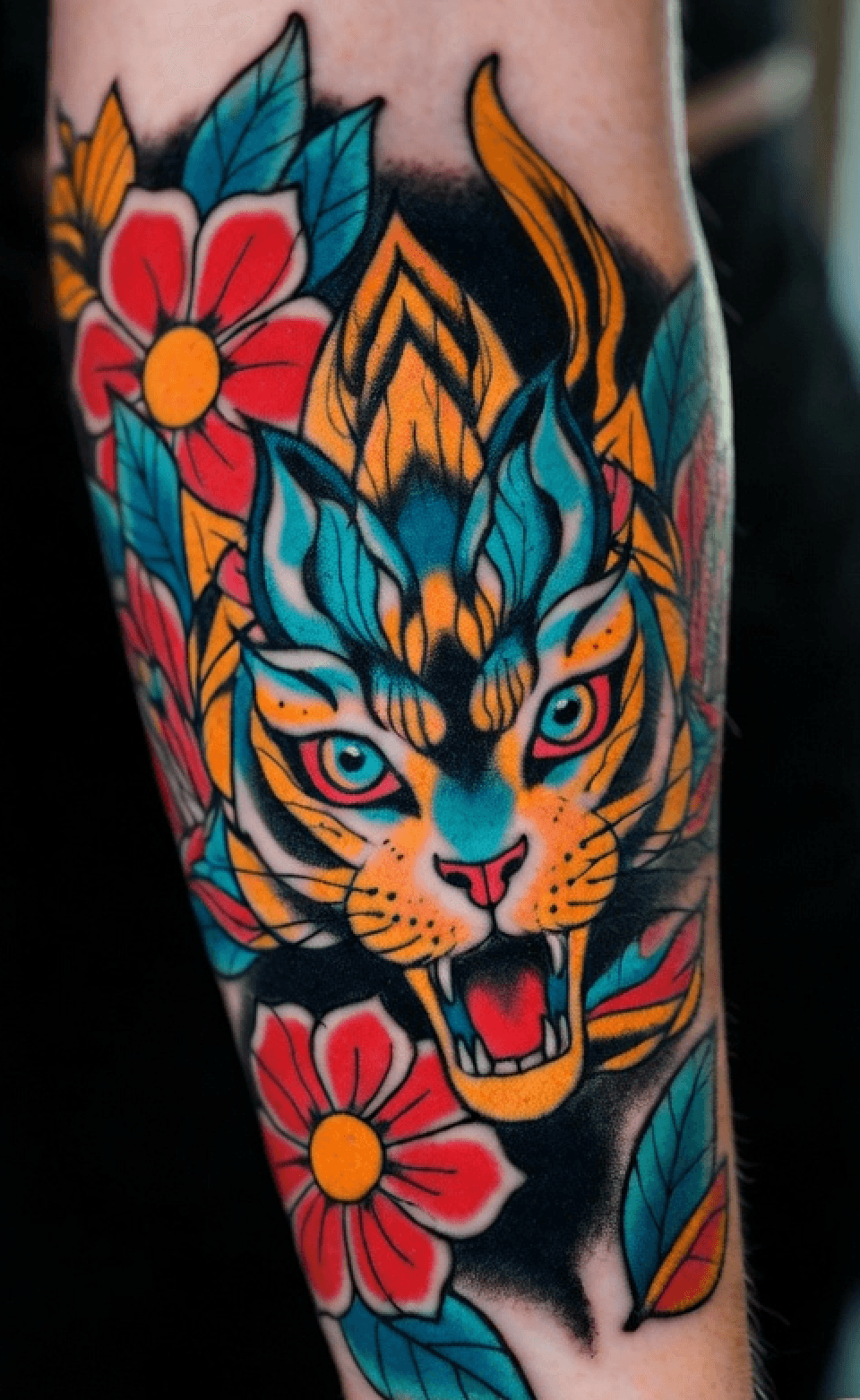 Before and after cover-up: old faded name transformed into neo-traditional floral piece by Riven Cole