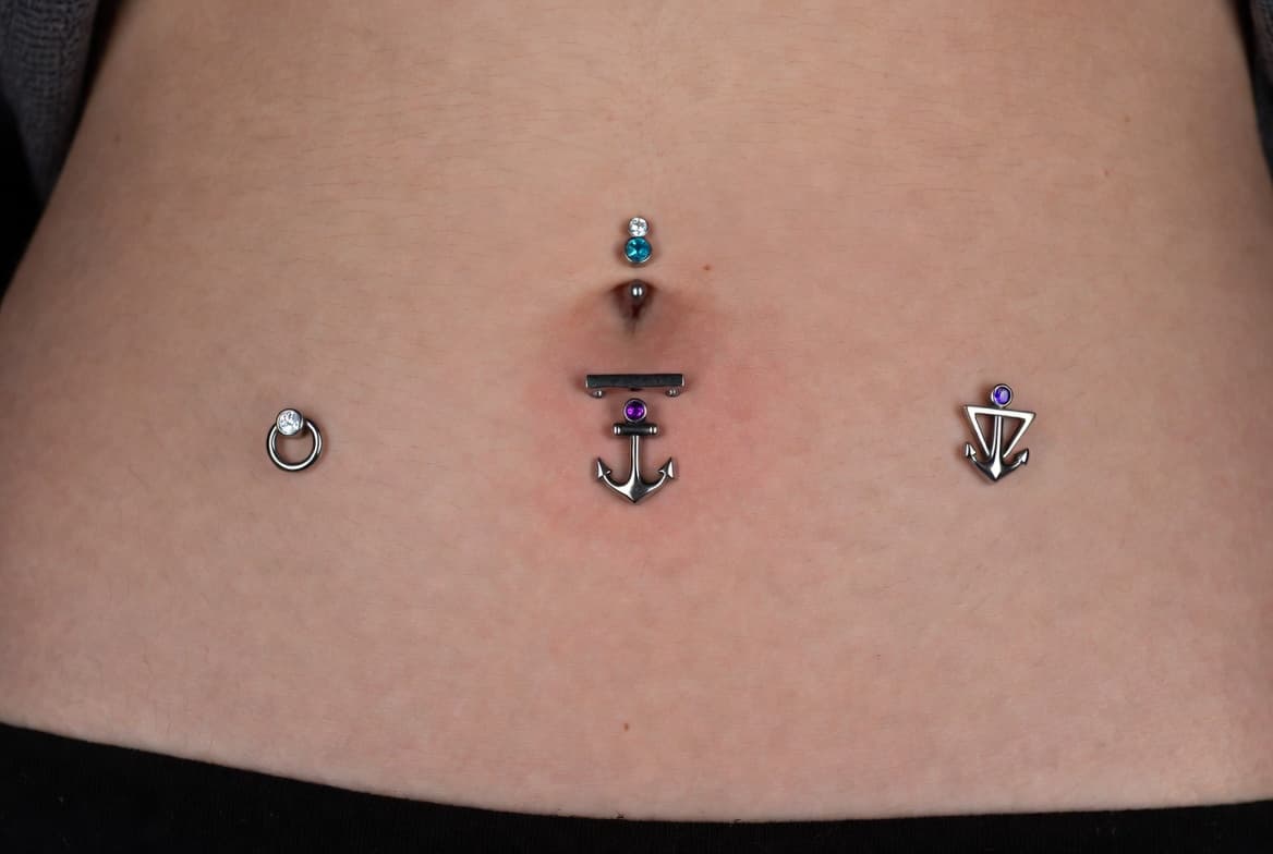 Custom dermal anchors and surface piercings by Luna Voss